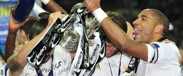 Michu and Ashley Williams celebrate winning the Capital One Cup in 2013