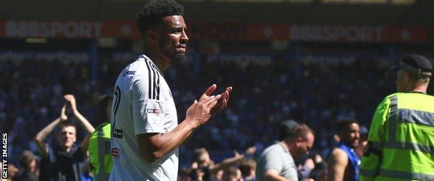 Cyrus Christie applauds Fulham's supporters
