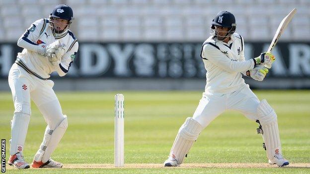 Yorkshire wicketkeeper Jonny Bairstow reacts as Warwickshire opener Varun Chopra cuts for four