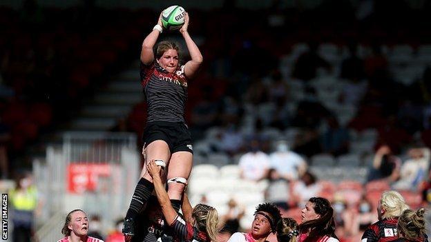 Poppy Cleall catches the ball in a line-out