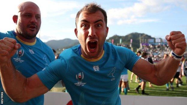 Uruguay's Gaston Mieres and Juan Rombys celebrate victory