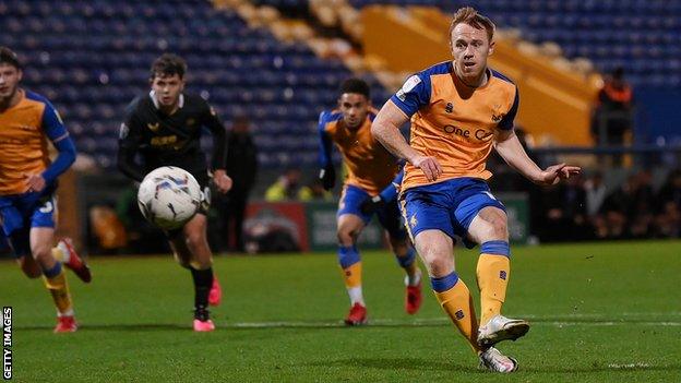 Danny Johnson scoring for Mansfield Town in the EFL Trophy