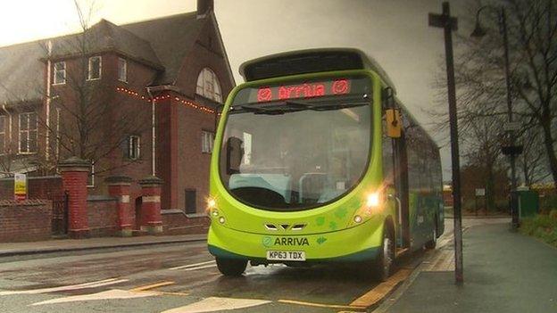 The electric bus receives a wireless booster charge at the start and end of the line