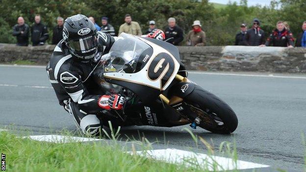 Jamie Coward races his motorbike on the Isle of Man