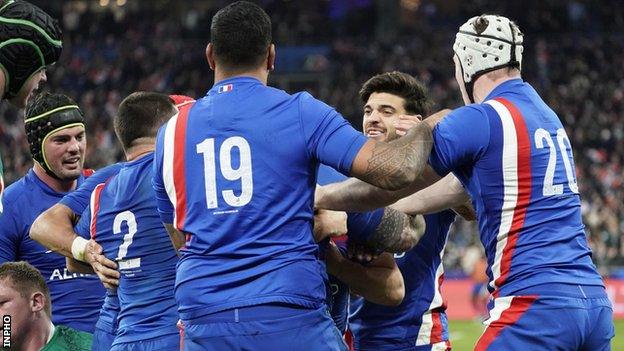 France celebrate Cyril Baille's try