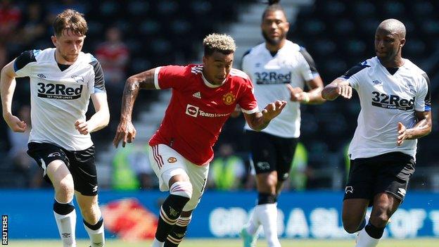 Derby players chase Jesse Lingard