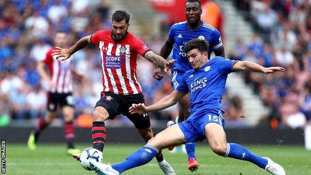 Leicester's Harry Maguire makes a tackle