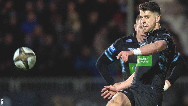 Adam Hastings kicks the ball for Glasgow Warriors