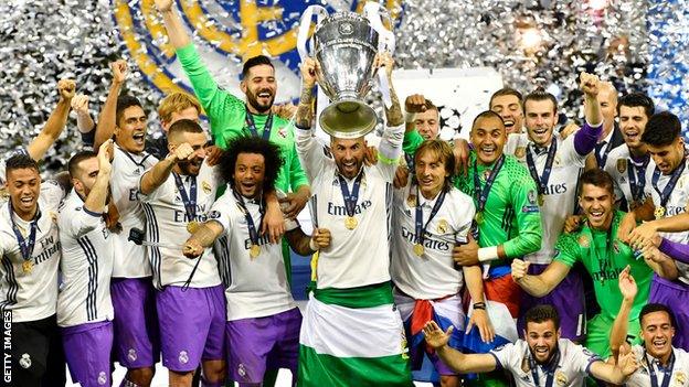 Sergio Ramos of Real Madrid lifts the trophy after Real Madrid win the Champions League final