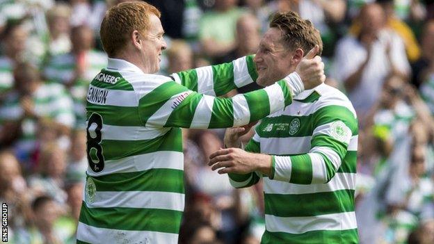 Hibernian manager Neil Lennon greets Kris Commons during Sunday's charity game