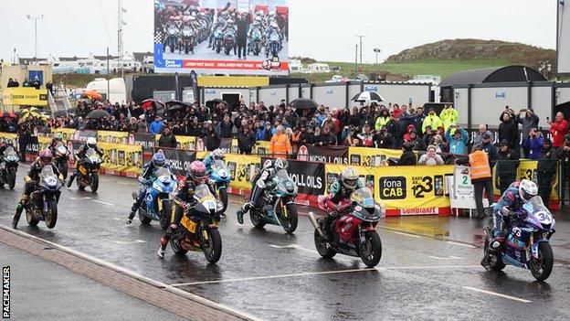 Alastair Seeley leads the field away for the Supersport race