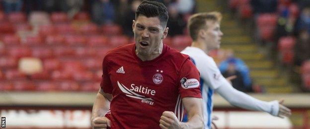 Aberdeen defender Scott McKenna celebrates