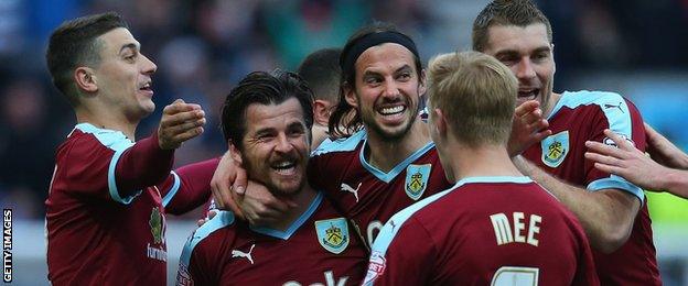 Joey Barton (centre) celebrates scoring with his Burnley team-mates