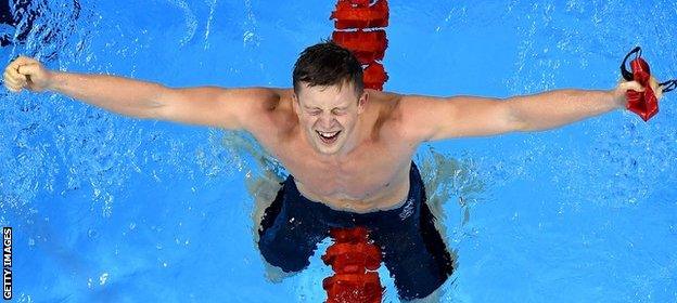 Adam Peaty celebrates Olympic gold