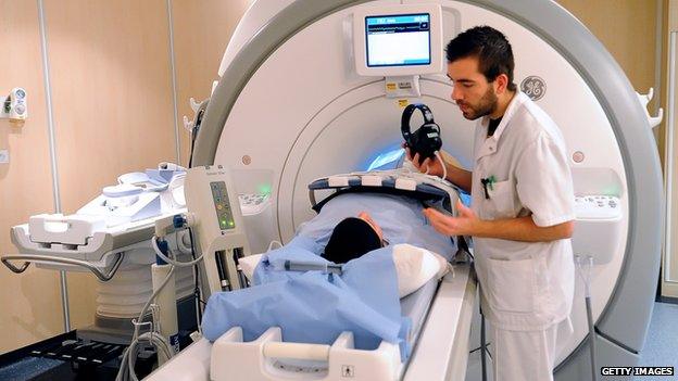 patient, technician and MRI scanner