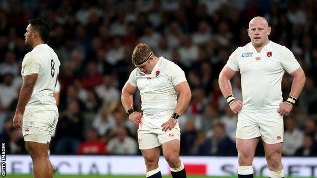 England's players look dejected at the end of the match