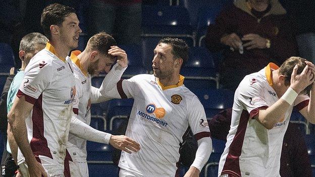 Louis Moult (second left)