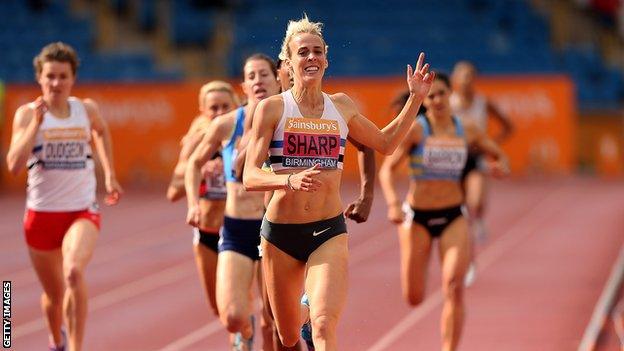 Lynsey Sharp crosses the line in Birmingha