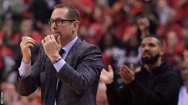 Toronto Raptors coach Nick Nurse with Raptors ambassador and fan, music star Drake, looking on