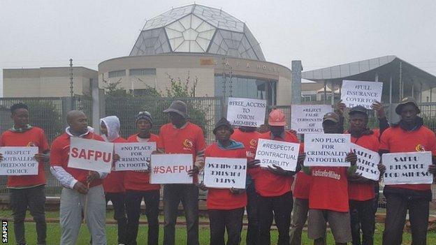 Local players protest outside Safa headquarters on the day of Infantino's visit