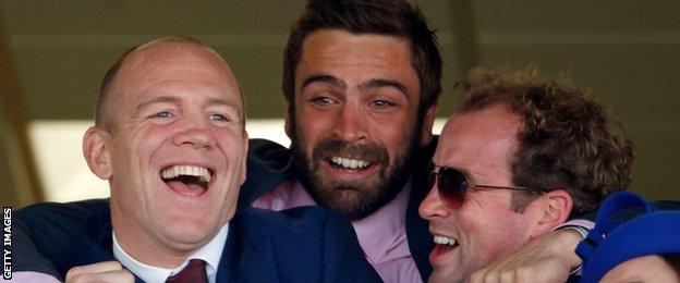 Mike Tindall, Nicky Robinson and James Simpson-Daniel celebrate as their horse Monbeg Dude comes third in the Grand National