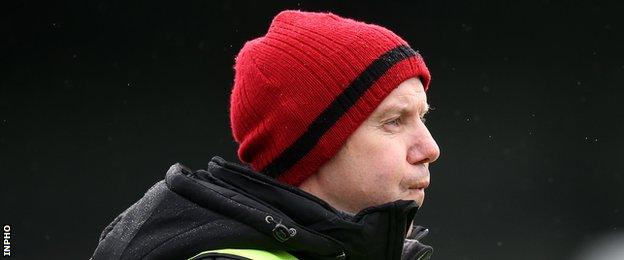 Down manager Eamonn Burns shows his frustration during the Mourne County's latest defeat by Roscommon