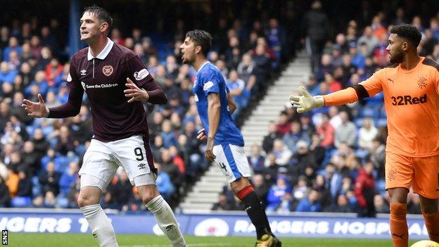 Kyle Lafferty passed up a late chance for Hearts