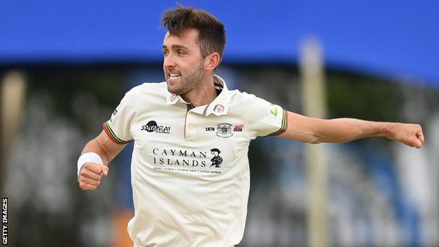 Gloucestershire bowler Matt Taylor celebrates a wicket