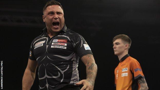 Gerwyn Price celebrates during his win over Bradley Brooks