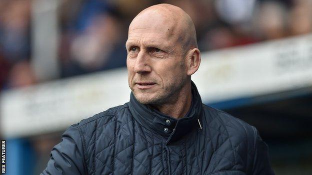 Reading manager Jaap Stam watches from the sidelines against Leeds