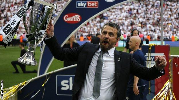 Fulham manager Slavisa Jokanovic celebrates with the Championship play-off trophy