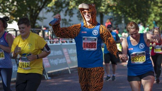 Runners finishing the Cardiff Half Marathon