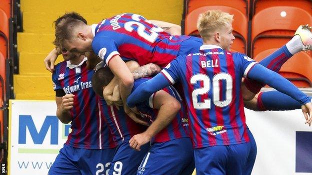 Iain Vigurs celebrates after making it 1-0 Inverness