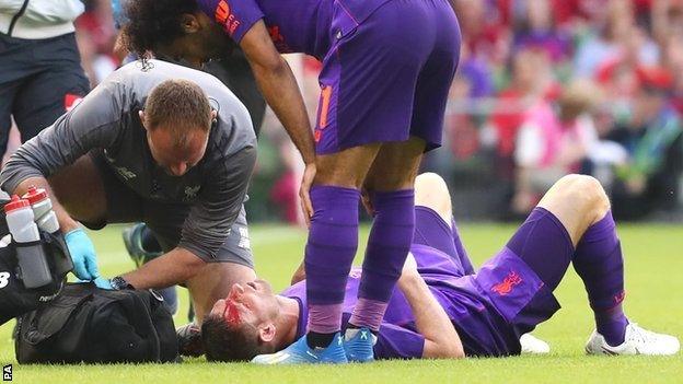 Liverpool's James Milner suffers head injury