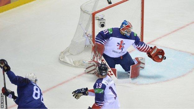 Ben Bowns makes a save for Great Britain against France at the 2019 Ice Hockey World Championships in Slovakia