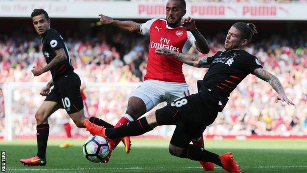 Theo Walcott and Alberto Moreno