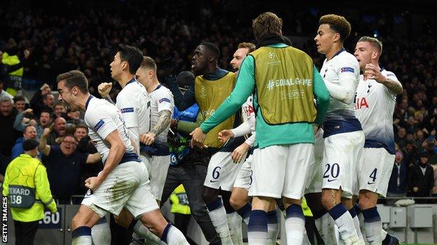 Tottenham's players celebrate scoring against Manchester City in the Champions League