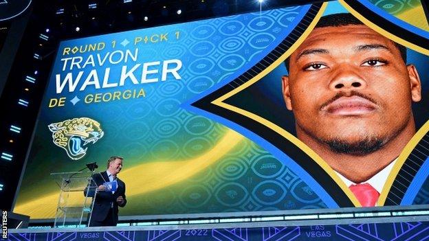 NFL commissioner Roger Goodell announcing Travon Walker as the first pick at the 2022 draft