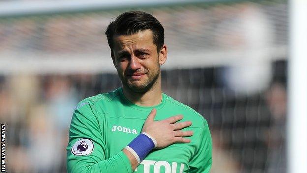 Lukasz Fabianski shows his emotions as Swansea are relegated from the Premier League