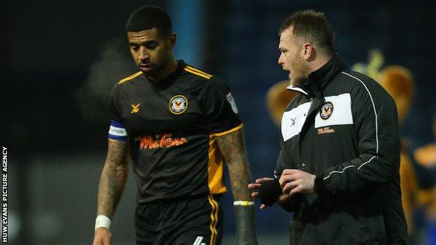 Newport midfielder Joss Labadie and boss Mike Flynn talk tactics last season