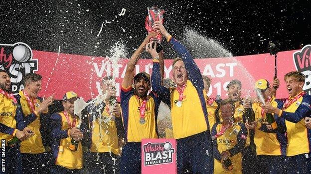 Ravi Bopara and Simon Harmer lift the T20 Blast trophy aloft after Essex's win over Worcestershire