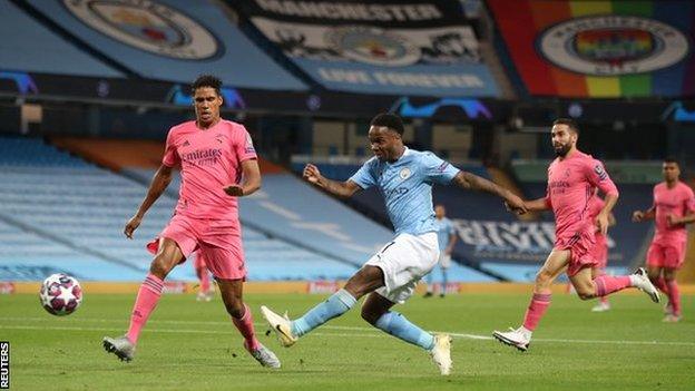 Raheem Sterling has a shot during Manchester City's Champions League game with Real Madrid