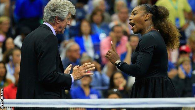 Serena Williams speaks with referee Brian Earley before continuing with her match against Naomi Osaka