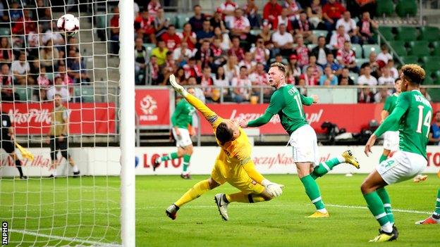 Aidan O'Brien's header beats Poland keeper Wojciech Szczesny in Wroclaw