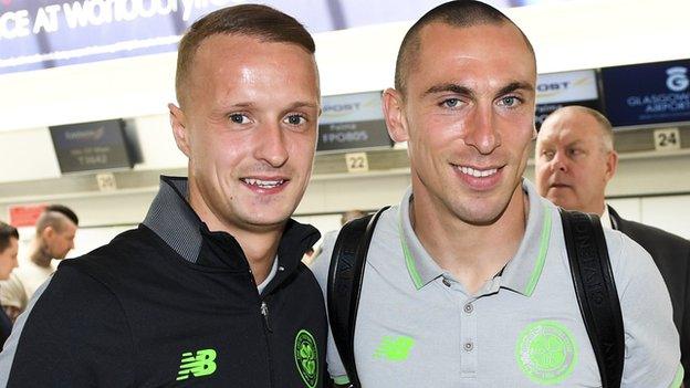 Celtic striker Leigh Griffiths and midfielder Scott Brown at Glasgow Airport