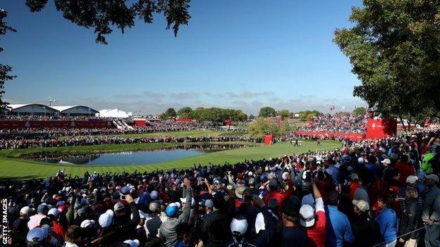 Fans by the 16th green at Hazeltine