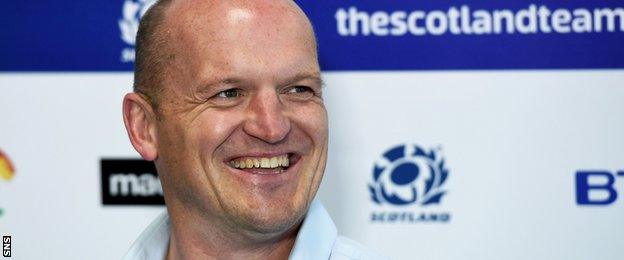 Gregor Townsend jokes with the media after announcing his squad