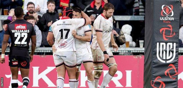 James Hume celebrates his try