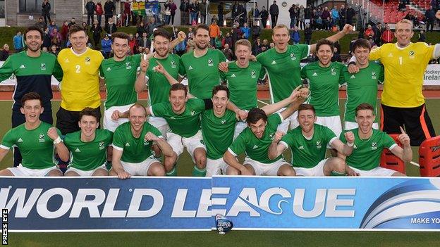 The victorious Ireland team celebrate their World League success after overcoming France