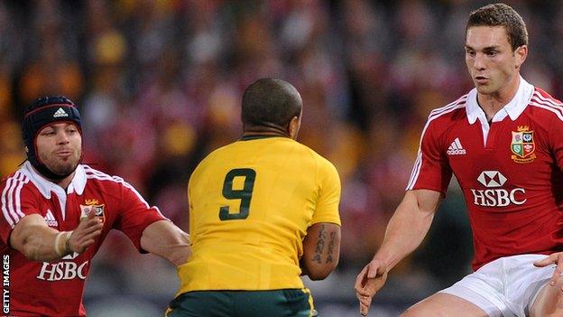 Leigh Halfpenny and George North face Will Genia for the 2013 Lions